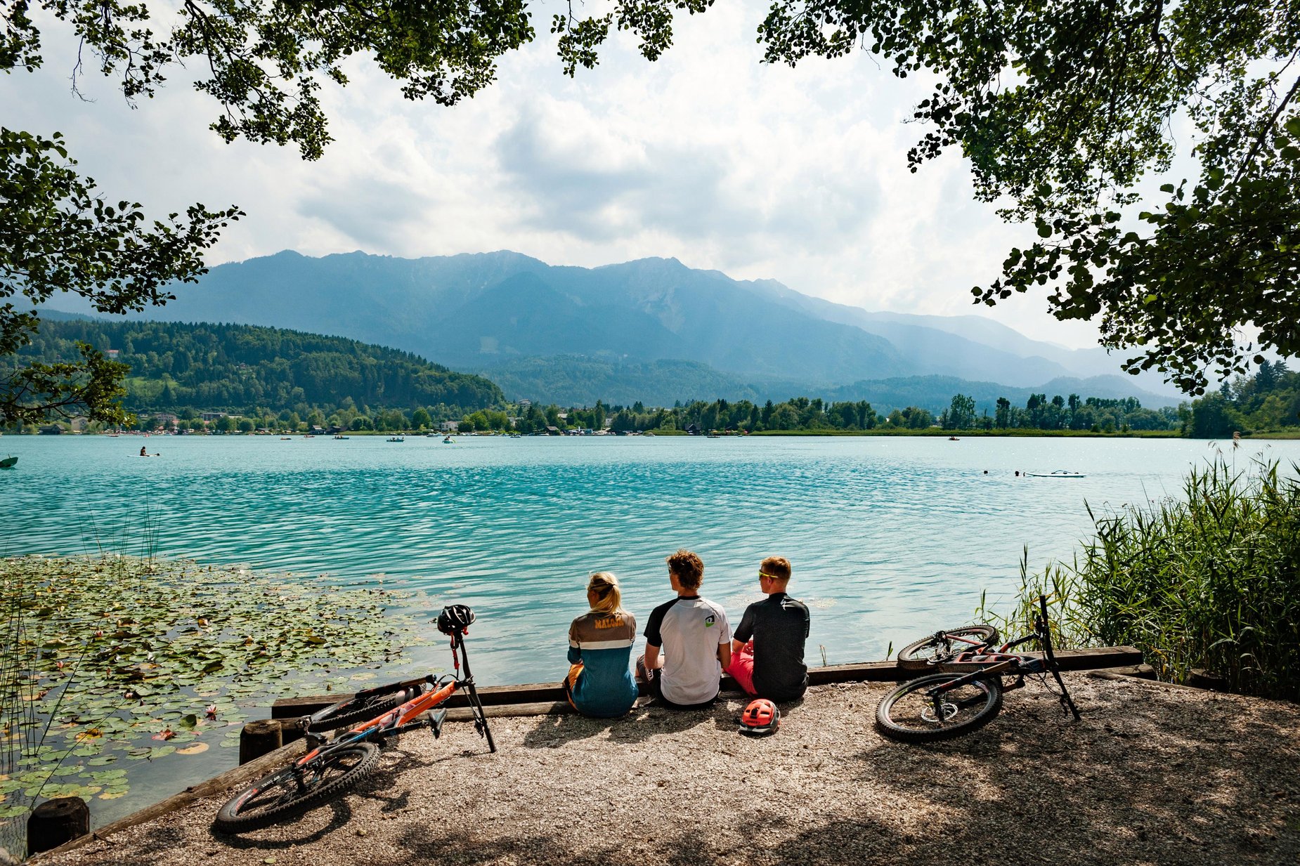 Mountainbiker sitting on a wonderful alp.